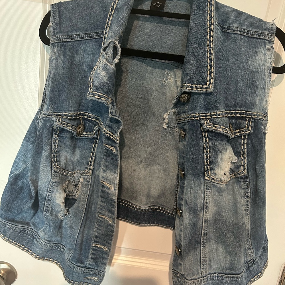 Lane Bryant woman’s Distressed Blue Denim Vest